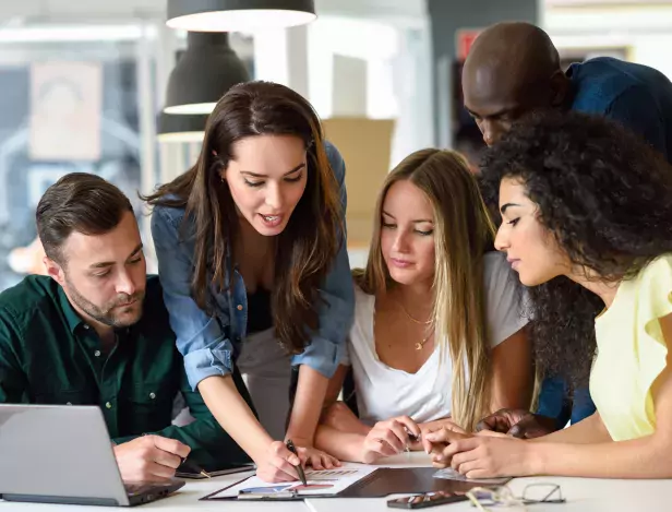 multi-ethnic-group-of-young-men-and-women-studying-indoors